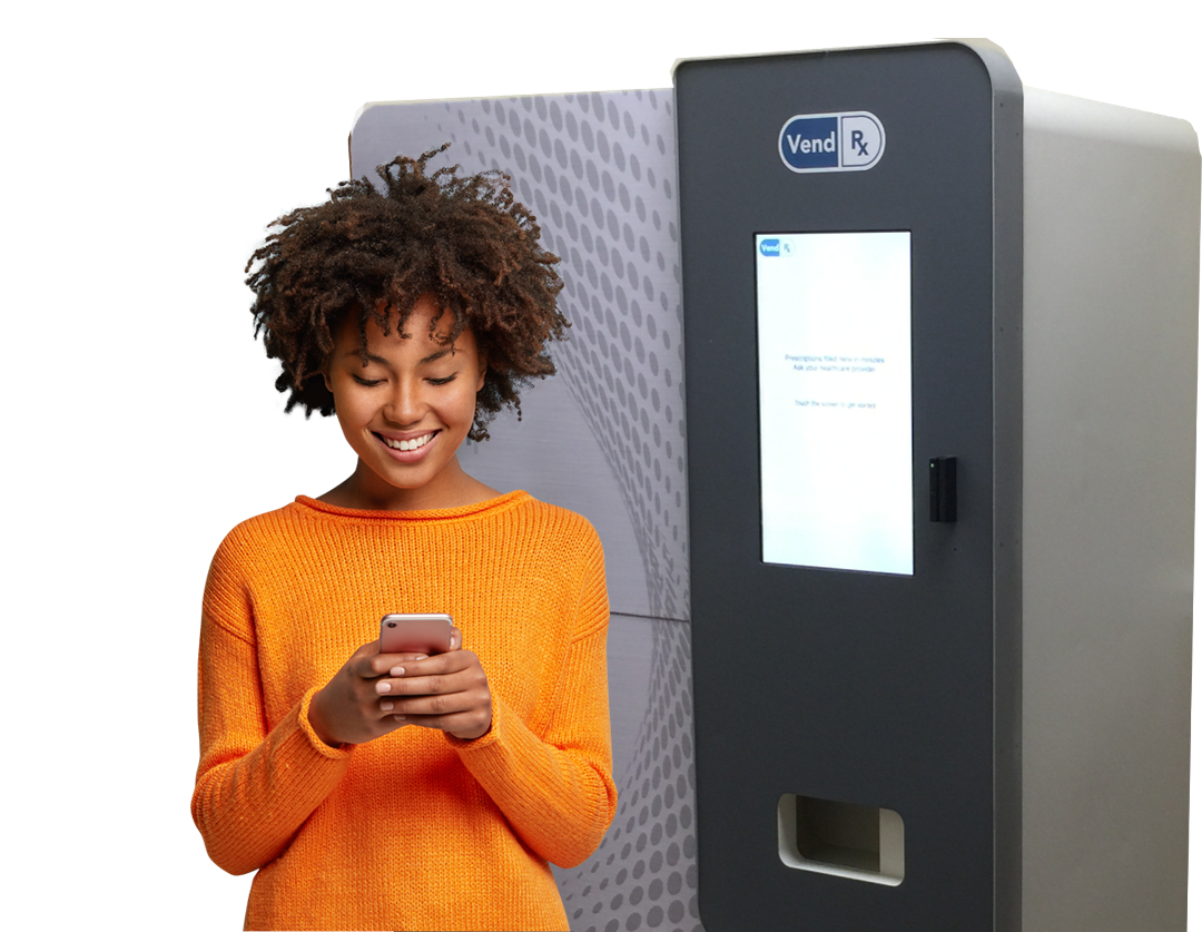 Patient using VendRx automated pharmacy dispensing system